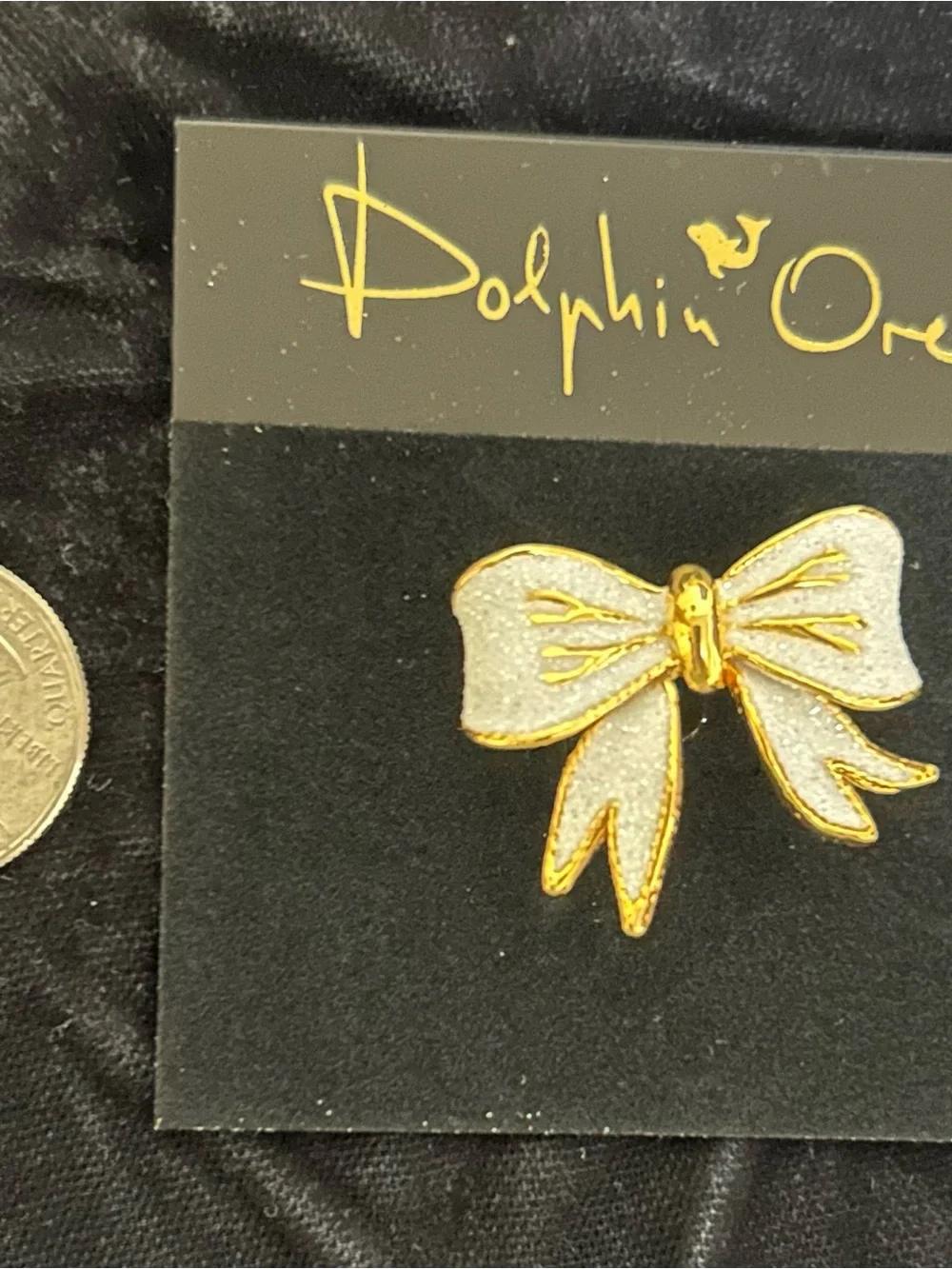 White Enamel Bow Broach with Gold Trim
